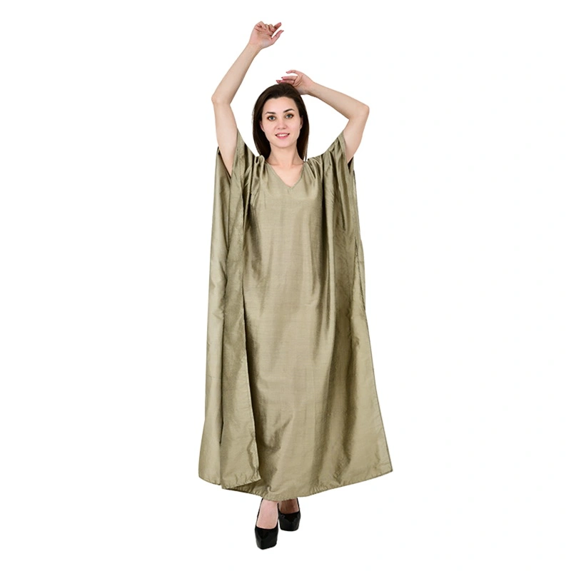 Female model in gold khaki shimmer kaftan dress with batwing sleeves - fashion ecommerce photography by Lohar Studio Delhi